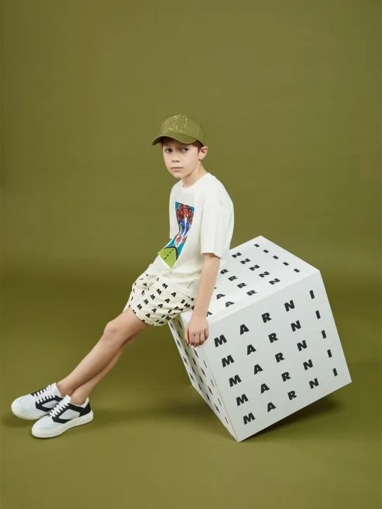 Marni Junior   All over logo print cotton shorts 